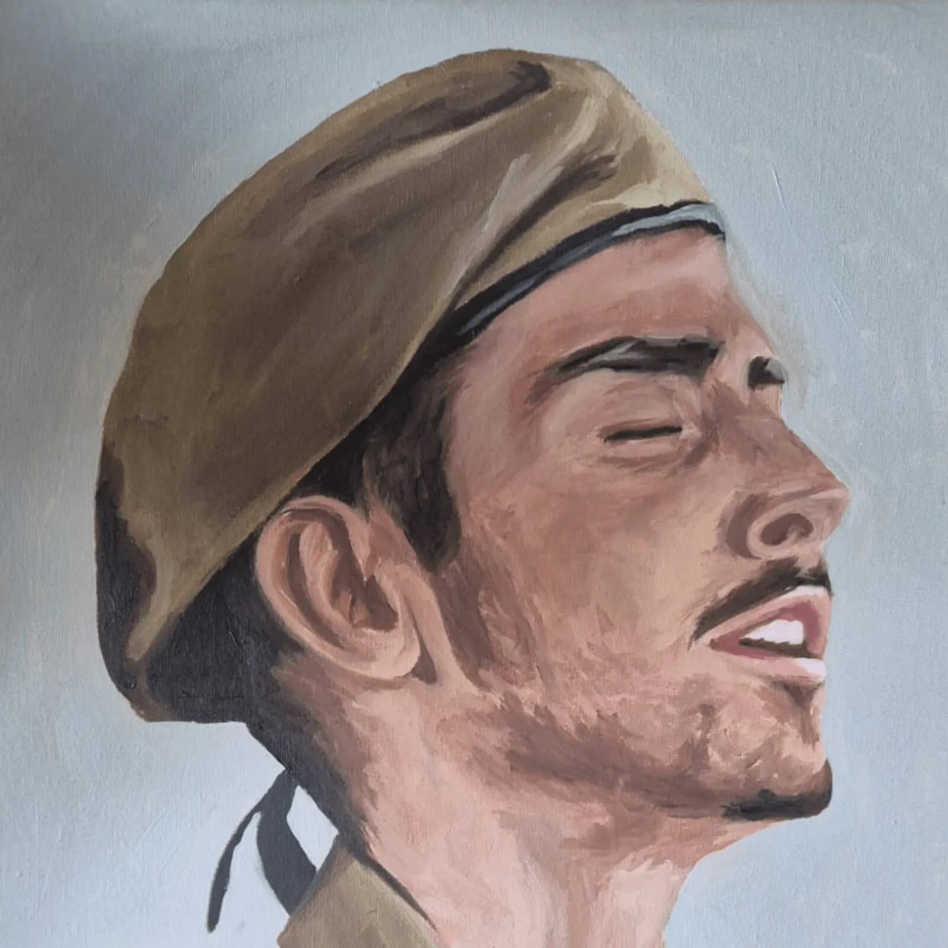 A painted portrait of Ephraim Jackman zt&rdquo;l — in his soldier's beret, eyes closed, his face raised